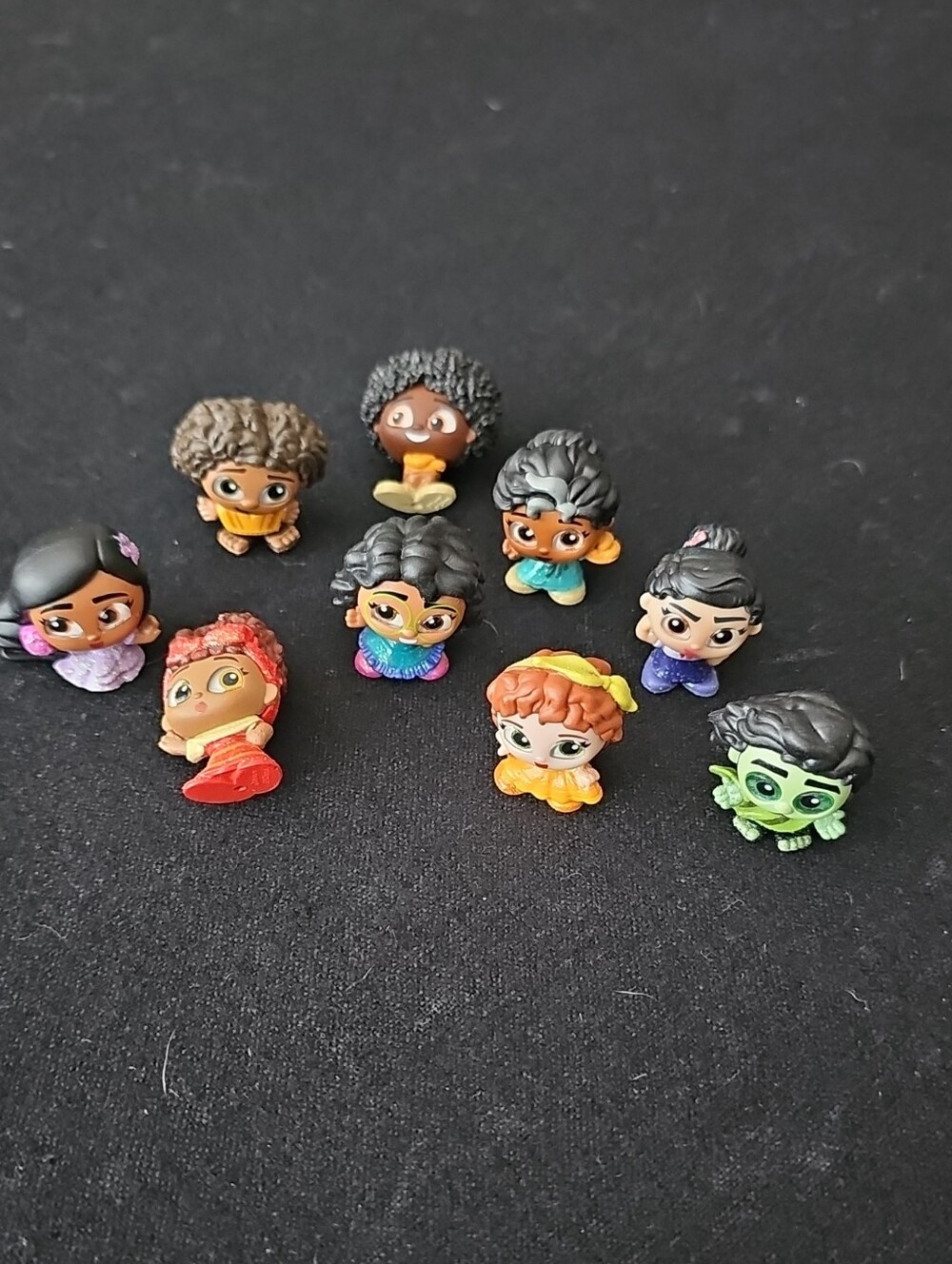 All 9 Disney Doorables Encanto Collection Peek figures made by Just Play.